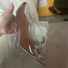 Clear Never Used Brand New Size 9 Amina Muaddi Heels Soles Are Clean Never Used Elegant Clear Closed Toe Heels, Clear Pointed Toe Heels For Evening, Evening Clear Pointed Toe Heels, Elegant Clear Heels With Heel Strap, Designer Clear Heels For Evening, Elegant High Heel Clear Heels, Elegant Clear Heels With Round Toe, Elegant Clear High Heels, Designer Clear High Heels