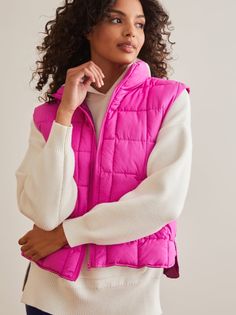 This puffer vest is the perfect layering piece for chilly days, offering warmth without sacrificing mobility. It features a convenient full-zip closure and two front pockets, ideal for keeping your hands warm or storing small essentials. White Dress Skirt, Puffer Vests, Workout Clothing, Active Jacket, Women's Activewear, Mini Dress Shop, Altar'd State, Winter 2024, Puffer Vest