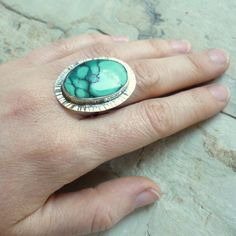 https://www.etsy.com/listing/232262287/blue-turquoise-ring-sterling-silver?ga_order=most_relevant Turquoise Sterling Silver Ring With Bezel Setting, Unique Turquoise Rings With Polished Finish, Turquoise Oval Cabochon Ring With Large Stone, Polished Turquoise Ring As Gift, Polished Turquoise Ring For Gift, Unique Turquoise Oval Cabochon Ring With Large Stone, Oval Turquoise Chrysocolla Ring In Silver, Unique Silver Turquoise Oval Cabochon Ring, Unique Large Stone Oval Cabochon Turquoise Ring