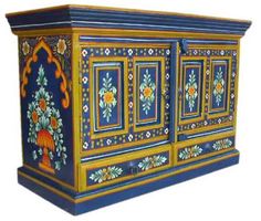 a blue and yellow painted cabinet with floral designs on it's doors, in front of a white background