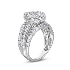 Show her how much she means to you when you celebrate your love with this vintage-inspired pear-shaped multi-diamond engagement ring in white gold. Crafted in cool 10K white gold A 1/5 ct. round diamond - artfully set to enhance size and radiance - shines at the center of the pear-shaped diamond composite. The split shank shimmers with a middle row of channel-set round diamonds bordered in intricate milgrain. Contoured diamond-lined borders add a final layer of sparkle to the design. This engage Shank Engagement Ring, Split Shank, Pear Shaped Diamond, Channel Set, Vintage Diamond, Pear Shaped, Round Diamond, Diamond Engagement, Diamond Engagement Rings