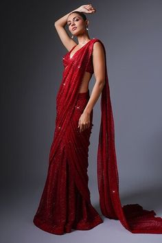 Red lehenga saree with crystal, bugle bead, thread embroidery in geometric pattern. Paired with cutwork embroidered blouse. - Aza Fashions Red Pre-draped Saree With Cutdana For Celebrations, Bollywood Style Red Pre-draped Saree With Self Design, Elegant Red Pre-draped Saree For Festive Occasions, Elegant Red Pre-draped Saree For Diwali, Elegant Red Lehenga With Sequins, Red Fitted Pre-draped Saree For Wedding, Red Lehenga With Sequins In Traditional Drape, Red Lehenga With Sequins And Traditional Drape, Red Sequined Lehenga In Traditional Drape