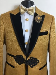 Our new gold, floral print, three piece tuxedo will be an excellent addition to your formal wardrobe. It's luxurious velvet collar will sport a look of elegance that all will notice. This tuxedo includes beautiful button covers, matching cufflinks, and a stunning bow tie. Luxury Gold Suit For Party, Luxury Gold Evening Blazer, Gold Festive Evening Suit, Gold Tailored Suits For Party, Tailored Gold Suit For Party, Tailored Gold Suits For Evening, Luxury Gold Blazer For Formal Occasions, Designer Gold Blazer For Formal Occasions, Designer Gold Blazer For Party