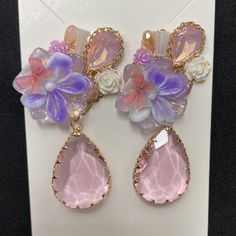 Fairycore Pink & Purple Floral Dangle Statement Earrings New Boutique Item Never Worn Please See Photos For More Details Bundle Two Or More Items From My Closet To Save 30% And Save On Shipping Purple Fairycore Jewelry For Party, Pink Fairycore Earrings As Gift, Fairycore Pink Earrings For Gifts, Fairycore Pink Earrings As Gift, Fairycore Earrings For Pierced Ears For Party, Whimsical Purple Dangle Earrings, Whimsical Purple Drop Earrings, Purple Clip-on Earrings For Party, Whimsical Purple Dangle Flower Earrings