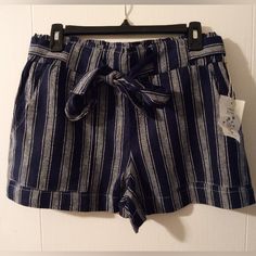 Indigo Rein Striped High Waist Shorts. Color Blue W/White Stripes. Pull On Style. Side Pockets. Linen Blend. Machine Washable. Rise 11 In. Inseam 3 In. Nwt Casual Navy Shorts For Beach Season, Navy Shorts With Elastic Waistband For Spring, Navy High Waist Shorts For Summer, Navy High-waisted Shorts For Spring, Navy High-waist Shorts For Summer, Navy Bermuda Shorts For Summer, Casual High Waist Striped Shorts, Navy Bottoms For Summer Day Out, Navy Beach Shorts For Spring