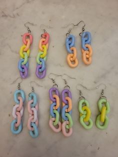 "Your choice of 5 styles of chunky plastic chain link earrings. Each link measures .75\" x .5\".  Available in: Rainbow - 3\" Long Blue and Peach - 2.5\" Long Trans Flag - 2.75\" Long Purple, Peach, Blue, Green & Pink (Random) - 2.75\" Long Green and Yellow - 1.75\" Long All of my earrings come with little silicone backs." Multicolor Chunky Chain Link Jewelry, Trendy Resin Chain Jewelry, Trendy Chunky Chain Link Earrings, Plastic Chain Link Jewelry For Gifts, Multicolor Plastic Chain Jewelry, Kawaii Ring, Chain Link Earrings, Trans Flag, Link Earrings