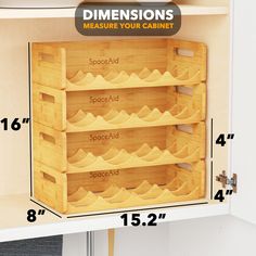 a wooden cabinet with drawers labeled measurements