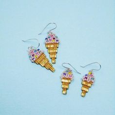 How cute, right? :) COLORWAY: blush, purple, yellow, pink, turquoise, blue, dark pink, gold MATERIALS: -Tile beads -Delica beads -Faux leather backing -Handmade sterling silver ear wires APPROXIMATE DIMENSIONS: Large Cone: Length 1&3/4", Width 1/2" Small Cone: Length 1&1/4", Width 1cm   Priority mail used for swift shipping and tracking info on orders over 75$ in the US. For more info about Wild Mint Jewelry check out: Cute Beaded Earrings, Wild Mint, Mint Jewelry, Lawrence Ks, Rose Blush, Beaded Earrings Patterns, Bead Work Jewelry, Creating Jewelry, Earring Patterns