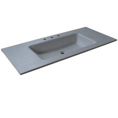 a white sink sitting on top of a counter