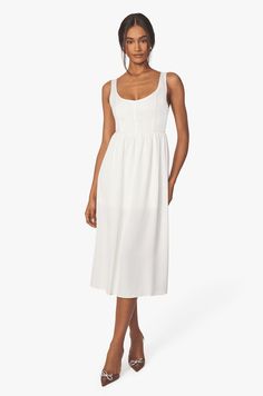 The Whisper White Corset Midi Dress will be your freshest closet staple this summer! Featuring a snug corset bodice and an A-line skirt, this sophisticated scoop neck dress gives off an effortlessly-chic look. Pair it with the Gracen Metallic Mule to elevate your look. Beautiful White Dresses, Corset Midi Dress, Romantic Summer, White Corset, Women Corset, Corset Bodice, Whisper White, Scoop Neck Dress, V Neck Midi Dress