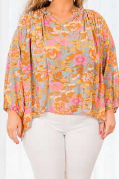 We are SO in love with this FAB top! Featuring a stunning floral pattern and a lovely teal color mix, this top is the ultimate chic addition! Versatile enough to pair with leggings or colored denim for any occasion! Don't miss out on this must-have piece! 100% Rayon Flowy Printed Top For Brunch, Flowy Multicolor Floral Print Tops, Green Floral Print Tops For Day Out, Green Floral Print Tops For Fall, Flowy Multicolor Top For Brunch, Green Floral Print Fall Tops, Floral Print Tops For Day Out In Fall, Flowy Floral Print Top For Day Out, Floral Print Tops For Fall Day Out