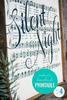 a sign that says silent night with musical notes on it and the words printable