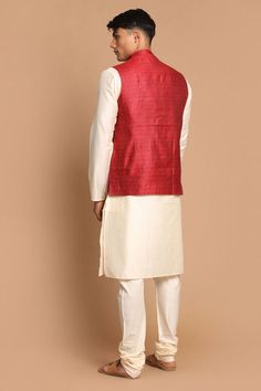 VASTRAMAY Father-Son Ethnic Set Dress in sophisticated style with this traditional Baap Beta set featuring a maroon woven Nehru jacket, a cream kurta, and comfortable cream pajamas. Perfect for special occasions or festive wear. Key Features Maroon woven Nehru jacket with traditional design Cream colored kurta with mandarin collar and long sleeves Cream colored churidar pajamas for comfort Available in various sizes (size chart not shown here) Specifications Sleeve Length - Long Sleeves Top Shap Cream Pajamas, Nehru Jacket, Nehru Jackets, Woven Jacket, Festive Wear, Cotton Bottoms, Father Son, Sleeves Top, Sleeveless Jacket