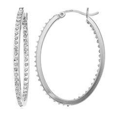 Treat yourself to the one-of-a-kind style of these Diamond Mystique hoop earrings, featuring a dazzling combination of diamonds and crystallized diamond dust in an inside out design. Treat yourself to the one-of-a-kind style of these Diamond Mystique hoop earrings, featuring a dazzling combination of diamonds and crystallized diamond dust in an inside out design. EARRING DETAILS Length: 1.37 in. Backings: click-it Metal: sterling silver Finish: polished Packaging: boxed DIAMOND MYSTIQUE DETAILS Oval Cubic Zirconia Hoop Earrings With Diamond Cut, Oval Diamond Hoop Earrings With Diamond Accents, Oval Diamond Hoop Earrings With Accents, Oval Hoop Earrings With Diamond Accents In Diamond White, Diamond White Oval Hoop Earrings With Diamond Accents, Oval Diamond Hoop Earrings Gift, Silver Diamond Hoop Earrings With Rhinestones, Silver Oval Hoop Earrings With Diamond Accents, Oval Hoop Earrings