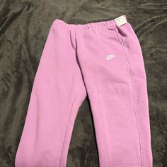 Nike Club Fleece Jogger Violet Shock Size L Casual Purple Activewear For Loungewear, Nike Solid Color Athleisure Sweats, Nike Athleisure Sweats, Athleisure Fleece Sports Pants, Spring Fleece Activewear For Gym, Spring Fleece Joggers For Jogging, Spring Fleece Sweatpants In Athleisure Style, Fleece Sweats For Jogging In Spring, Nike Sweatpants For Spring Sports