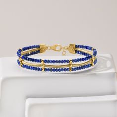 Ross-Simons - Lapis Bead, Snake-Chain Bracelet in 18kt Gold Over Sterling. 7". Offering a regal look, our three-strand bracelet features a gleaming 18kt yellow gold over sterling silver snake chain nestled between two rows of 3mm round faceted lapis beads. Includes a 1" extender. Natural pyrite flecks in lapis will vary. Lobster clasp, lapis bead snake-chain bracelet. Spiritual Yellow Gold Beaded Jubilee Bracelets, Spiritual Yellow Gold Beaded Jubilee Bracelet, Gold Lapis Lazuli Bracelet With Gemstone, Luxury Gold Bracelets With Gemstone Beads, Luxury Gold Beaded Bracelets With Gemstones, Luxury Gold Beaded Gemstone Bracelets, Luxury Gold Beaded Bracelet With Gemstones, Gold Lapis Lazuli Gemstone Bracelet, Elegant Yellow Gold Bracelets With Gemstone Beads