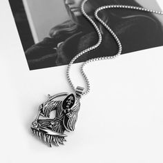 Chain: 22" + 2" inches chain necklace. 3.0 mm Wide Link chain Pendant size:Grim Reaper necklace pendant is about 6.4 cm x 4.0cm / 2.50" x 1.57" Metal:Chain necklace and Pendant are Stainless Steel, Never Rust or Fade Perfect Gift:Including a beautiful gift box printed with Brand Name "Scddboy". In case you buy it as a gift - you may be sure it looks nice 💝 Customer Service☛ Please feel free to contact us if you have any question about this item.We provide 30 days refund or size exchange guarant Halloween Stainless Steel Chain Necklace, Gothic Stainless Steel Necklace With Adjustable Chain, Gothic Pendant Necklace With Silver Chain, Punk Style Engraved Necklace For Gift, Halloween Engraved Metal Necklace, Punk Skull Necklace In Stainless Steel, Punk Skull Shaped Stainless Steel Necklace, Gothic Stainless Steel Clavicle Chain Necklace, Punk Skull Stainless Steel Necklace