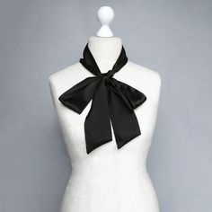 The black silk hand-made skinny scarf This black silk bow tiу adds a silky, sophisticated accent for year-round wear. The bow tie is a perfect way to accentuate simple clothes to look smart The necktie is produced from 100% silk. Sizes: Width: 8 cm / 3.14 inches Length: 177 cm / 70 inches Handmade item The product manufacturing takes 1-3 working days Please note that the color may slightly vary due to photographic lighting sources or your monitor settings. Check my other listings to see more siz Chic Silk Scarf For Party, Chic Silk Party Scarf, Classic Silk Scarves For Evening, Chic Silk Scarves For Gifts, Chic Silk Scarves Perfect For Gifts, Formal Scarf Neckwear, Classic Silk Evening Scarf, Elegant Party Scarf, Chic Formal Scarf As Neckwear