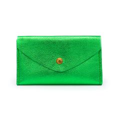 Green - MetallicTHE wallet. Functions like a dream, holds all you need, doubles as a clutch. Available in a myriad of colorful leather options, so you can choose the one that is perfectly you. This classic design features 6 credit card slots, a compartment for organizing bills and receipts, and a back zippered coin pocket— all in a slender silhouette. The sleeve of this wallet also holds your phone, so feel free to carry it solo anytime you feel like getting dressed up. Available in soft chrome Organizing Bills, Bill Organization, Snap Wallet, Getting Dressed, Colored Leather, Neutral Colour Palette, Vegetable Tanned Leather, Get Dressed, Neutral Colors