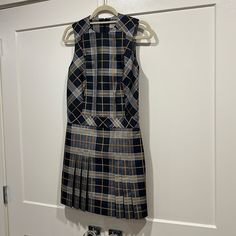 Burberry Pleated At The Bottom Sleeveless Dress Navy, Gold & White Back Zip Nwt Size 2 Plaid Sleeveless Lined Dress, Fitted Sleeveless Plaid Work Dress, Fitted Sleeveless Plaid Dress For Work, Burberry Dress, Burberry Plaid, Silk Shift Dress, Crochet Halter Tops, Cotton Poplin Shirt, Check Dress