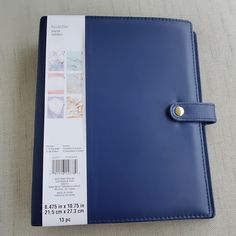 a blue folder with a barcode on it