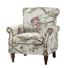 a white chair with flowers on it and nail polishing around the armrests