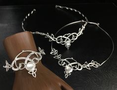 I will fabricate this complete romantic and Renaissance, boho inspired bridal set, in sterling silver, with a feminine and Celtic take on some Irish classic designs! I make everything in sterling silver, at my bench studio, and each piece is forged and fabricated one-at-a-time, by my hand only...nothing is pre-manufactured or made elsewhere! So, because of this, please allow me proper time to complete the set and ship in plenty of time for hair trials, etc. as I want to ensure I am not rushed an Elegant Silver Bridal Set With Intricate Design, Elegant Silver Adjustable Bridal Sets, Elegant Hand Forged Adjustable Jewelry, Elegant Adjustable Silver Bridal Sets, Hand Forged Elegant Adjustable Jewelry, Elegant Adjustable Hand Forged Jewelry, White Heirloom Jewelry For Ceremonial Occasions, Heirloom White Jewelry For Ceremonial Occasion, Elegant Adjustable Hand-forged Jewelry