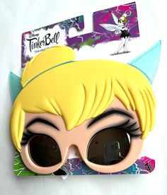 Show off your personality with Disney's Tinker Bell glasses in a variety of fun and bright colors. These kids' sun shades make the perfect gift, ideal for dress-up playwear and adding a touch of magic to fairytale fairy Princess parties. Let your little ones shine and embrace their inner fairy with these delightful Tinker Bell sunglasses. 1 Pair glasses 100% UV Protection Shatter Resistant Ages 4 and up. Fun Plastic Costume Accessories For Party, Fun Plastic Costume Accessories For Costume Party, Novelty Sunglasses For Summer, Novelty Plastic Sunglasses For Summer, Pink Novelty Plastic Sunglasses, Pink Novelty Sunglasses In Plastic, Fun Plastic Sunglasses For Playtime, Novelty Pink Plastic Sunglasses, Novelty Sunglasses With Tinted Plastic Lenses