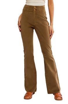 Designed to visually elongate your figure, these vintage-vibe pants are made from stretchy corduroy with a chic seamed waist and full-length flared legs. 33" inseam; 22" leg opening; 12" front rise; 14 1/2" back rise (size 29) 98% cotton, 2% elastane Dry clean or machine wash, tumble dry Imported Stretch Flare Corduroy Bottoms, Stretch Corduroy Flare Bottoms, Spring Flare Corduroy Bottoms, Spring Flared Corduroy Bottoms, Flare Corduroy Bottoms For Spring, Fall Cotton Flares With Flared Hem, Flared Corduroy Bottoms For Spring, Fitted Flare Corduroy Pants, Fitted Brown Flare Jeans