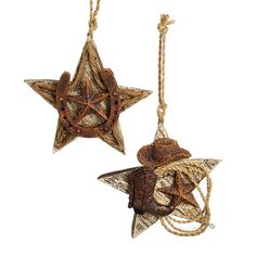 two star ornaments hanging from twine with rope on white background, one has a cowboy hat and the other has an ornament