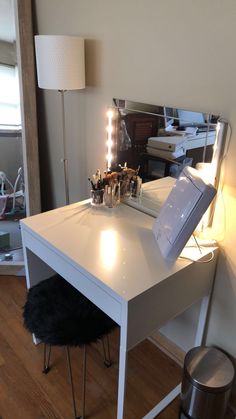 a white desk with some lights on it