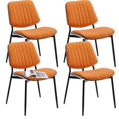 four orange chairs sitting next to each other