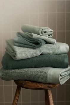 several folded towels stacked on top of each other