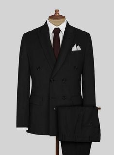 Make a move towards greater freedom, comfort and versatility in our Napolean Black Wool Suit that will also prove to be a stylish choice in your tailoring repertoire. Crafted from wool blend, the wool suit has the right balance of classic and boundary-push. Combine it with a crisp white shirt, plain gray tie and polished black dress shoes.  Look Includes   Napolean Black Wool Fabric  Double Breasted Jacket Style  Peak Lapel   Horn Royal   Black  Buttons  Single Vent  Three Cuff Buttons  Two Welt Timeless Fitted Double-breasted Suits, Black Wool Double Breasted Suit For Office, Black Double-breasted Suit With Concealed Placket, Double-breasted Wool Tuxedo For Work, Double Breasted Business Suit With Concealed Placket, Tailored Double-breasted Three-piece Business Suit, Business Double-breasted Suit With Concealed Placket, Wool Tuxedo With Hidden Button Closure, Black Double-breasted Suit With Pressed Crease