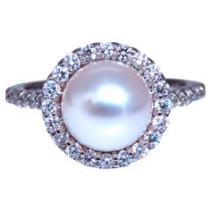 Natural Diamonds Pearl Ring 9mm South Sea White pearl .76ct Diamonds G-color Vs-2 clarity 14kt white gold 4.7 grams 12mm wide 10mm depth Size 7 $4000 Appraisal to accompany Pearl And Diamond Ring, Diamonds Ring, South Seas, South Sea Pearls, Pearl Diamond, Jewelry Rings Engagement, 14kt Gold, Pearl Ring, White Pearl