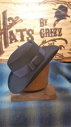 "UPDATED PRODUCTION TIME: ALL hat orders will be in the current production time of 10-12 WEEKS. If possible we will ship sooner. Lil Grizz is determined to give each hat the needed time and attention to detail. SILVERADO - This style is a wide brimmed variation of the standard Fedora hat. It has accentuated creases on the front and sides of the center point. It also has tight hand rolls on the front/sides of the standard cowboy brim. This hat is carries you back to the eras of Westerns and count Vintage Fedora With Flat Crown, Custom Formal Hat With Short Brim, Custom Adjustable Fedora For Formal Occasions, Fitted Hat Band For Kentucky Derby With Flat Crown, Classic Top Hat With Flat Crown For Western-themed Events, Adjustable Fedora For Formal Occasions, Classic High Crown Top Hat For Country Events, Fitted Hat Bands For Western-themed Events, Kentucky Derby Fitted Fedora With Flat Crown