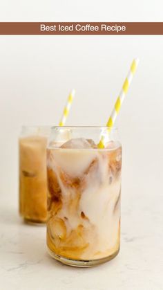 two glasses filled with iced coffee sitting next to each other