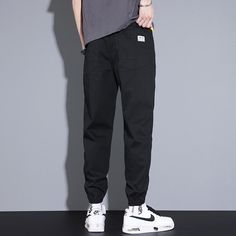 Vinny Loose Pants are a pair of men's relaxed fit jogging pants that can pair with a streetwear or workout outfit. Featuring a relaxed fit, these joggers offer maximum comfort for men who want to feel comfortable all day long. Available in the following variants: Black, Blue, Grey Material: Cotton & Polyster Style: Casual / Smart Casual Season: all seasons Gender: MEN Feature: Breathable/Comfortable, Stretched Size chart in CM Size chart in INCH Hip Hop Style Relaxed Fit Joggers With Elastic Waistband, Urban Baggy Joggers For Streetwear, Relaxed Fit Ankle-length Cargo Pants For Streetwear, Urban Tapered Leg Joggers For Streetwear, Streetwear Ankle-length Sweatpants With Side Pockets, Cotton Tapered Leg Sweatpants For Streetwear, Urban Streetwear Sweatpants, Baggy Urban Sweatpants Ankle-length, Hip Hop Style Tapered Leg Sweatpants For Streetwear