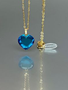 Gorgeous sparkly London blue topaz heart pendant necklace. The Faceted heart shape pendant is flawless and has and has the most vivid blue color that brings lots of depth to the stone and reflects lights beautifully. The pendant is strung on a 14K goldfilled chain. It is perfect for layering or looks great when worn alone. *Excellent qualityAAA+ Flawless London blue topazt Heart Shape Pendant *Pendant measure: 17mmx17 mm /0.7x 0.7 inch *Metal: 14K gold-filled/ Sterling Silver *necklace length: 4 Blue Heart Pendant Necklace With Birthstone, Blue Birthstone Heart Pendant Necklace, Blue Gemstone Heart Cut Necklace, Blue Heart Cut Jewelry With Heart Charm, Blue Gemstone Heart Necklace For Gift, Blue Heart Necklace With Birthstone, Blue Heart Shaped Birthstone Necklace, Sapphire Heart Pendant Necklace With Heart Charm, Elegant Blue Heart Necklace With Birthstone