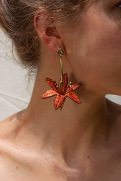 "\"Lilium are a genus of flowering plants which are important in culture and literature in much of the world. In the Victorian language of flowers, lilies portray love, ardor, and affection for your loved ones, while orange lilies stand for happiness, love, and warmth.\" - Wikipedia These light weight statement earrings are composed of hand dyed thick and rare luxurious vintage lace. Hand sewn into 6 petal flowers, they are shaped into 3 dimensional lilies with stamens of raw brass and coconut b Chunky Flower Earrings, Orange Statement Earrings, Floral Statement Earrings, Large Flower Earrings, Unique Statement Earrings, Orange Flower Earrings, Laces Aesthetic, Victorian Language, Orange Lilies