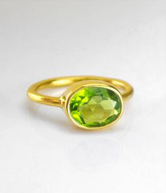 https://www.etsy.com/listing/528871116/?utm_content=buffere5a62&utm_medium=social&utm_source=pinterest.com&utm_campaign=buffer Oval Peridot Ring, August Birthstone ring, Peridot Green Stackable ring, Gemstone Ring, Gold Ring, Bezel Lisa Eldridge ring statement ring #daniquejewelry Peridot Rings In Lime Green As Gift, Lime Green Peridot Rings For Gift, Lime Green Peridot Rings For Gifts, Green Peridot Birthstone Ring, Lime Green Ring For May Birthstone, Lime Green Birthstone Ring As Gift, Lime Green May Birthstone Ring, Green Crystal Promise Ring With Gemstone, Peridot Birthstone Ring With Bezel Setting As Gift