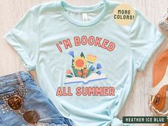 Can't. I'm booked all summer! Readers will love this shirt to wear all summer! At the library, at the beach, or just enjoying a nice book on a rainy day.  This brand of shirt is everyone's favorite. It's incredibly soft, lightweight, not boxy, just the right amount of stretch, comfortable yet cute. Your new go-to tee from Bella + Canvas. Professionally printed direct-to-garment printing, which prints the color directly into the shirt to ensure no cracking or peeling like vinyl or screen printing Summer Bookish T-shirt With Letter Print, Summer Graphic Print Bookish T-shirt, Bookish Short Sleeve T-shirt For Spring, Spring Bookish Short Sleeve T-shirt, Summer Funny Print T-shirt, Funny Print T-shirt For School In Summer, Spring Bookish Style Short Sleeve T-shirt, Spring Cotton T-shirt With Bookish Style, Spring Bookish T-shirt With Letter Print