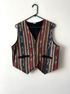 "Vintage Medium size Gentleman's Vest Student everyday classic vest Cotton patterned Mens Waistcoat Office Mens Vest Steampunk Vest  Estimated size: M Measurements:  (lying flat): Length: 19\"/ 48.5 cm *Pit to pit: 20.5\"/ 52 cm *Waist: 20\"/ 51 cm * measurements taken while garment lay flat, to get girth you need to double measurements. Please check measurements to insure a proper fit. Remember to allow yourself some extra room for movement. You can compare these with something from your closet that fits you well. This vest will come to you freshly laundered and ready to wear. Please feel free contact me if you need additional measurements or have any questions Condition: great Vintage Condition SHIPPING * I ship worldwide via Priority mail (Latvijas Pasts) from Latvia (EU). * I ship from Sleeveless Vest With Pockets For Festivals, Sleeveless Festival Vest With Pockets, Vintage Sleeveless Outerwear For Festivals, Steampunk Vest, Mens Waistcoat, Men's Waistcoat, Vest Men, Mens Vests, Denim Branding