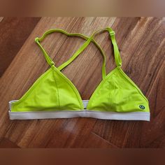 Lululemon Neon Lime Sports Bra. Brand New Condition, Bra Style Size 6. Runs Small In My Opinion Doesn't Fit Me, Basically Wore It Once But I'm A 34e Or 32 F Looked Cute On Me But Didn't Give Me Support So Have To Let It Go. Yellow Sporty Sports Bra For Summer, Yellow Summer Sports Bra For Gym, Yellow Fitted Sports Bra For Training, Athleisure Yellow Sports Bra For Gym, Yellow Sports Bra For Workout, Fitted Yellow Sports Bra For Light Exercise, Yellow Sportswear Sports Bra For Workout, Functional Yellow Activewear For Summer, Yellow Sporty Activewear For Light Sports