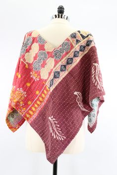 An effortlessly beautiful boho layering piece, this unique shawl is a pullover style. Made from kantha embroidered saris. 100% cotton Care Instructions: Hand wash and line dry for longest life. Disclaimer: The material used in this style is repurposed, vintage material. Small imperfections may be present. Fabrics may have small threads or holes in the layers. Small stains may be found. Anica Shawl, Unique Shawl, Boho Layering, Skylark, Repurposed Vintage, Vintage Material, Layering Pieces, Ponchos, Pullover Styling