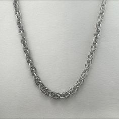 Elevate your street style with our Link Chain Necklace for Men and Women. This hip hop accessory boasts a simple twist design, adding a touch of uniqueness to any outfit. Made for both men and women, it's a versatile piece perfect for any fashion-forward individual. Necklace length 22.0 inch, Chain width 6 mm. Stainless Steel Chain Link Necklace For Streetwear, Silver Stainless Steel Chain Necklace For Streetwear, Streetwear Stainless Steel Silver Chain Necklace, Casual Chain Link Jewelry, Casual Metal Jewelry For Streetwear, Casual Metal Chain Necklace, Casual Chunky Chain Link Jewelry, Casual Silver Chain Necklace, Hip Hop Accessories