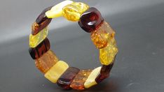 30,5 grams Genuine Big Natural Baltic Amber Bracelet MIX #Unbranded Elegant Multicolor Rectangular Bracelet, Modern Stretch Bangle Bracelet As Gift, Multicolor Rectangular Bracelets For Gifts, Handmade Rectangular Stretch Bracelet Gift, Elegant Multicolor Stretch Bracelet As A Gift, Amber Bracelet, Handmade Wire Jewelry, Amber Jewelry, Mix Color