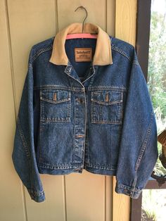 "Vintage Timberland Classic Denim Weathergear Jacket with Leather Trim.  Size L.  Made in Malaysia.  Machine wash cold.  100% indigo cotton with genuine leather trim.  23\" pit to pit; 22\" shoulder to hem;  21\" sleeve.   21\" shoulder to shoulder.  Excellent condition.  (small stain on right sleeve - see pic #4)" Fall Denim Blue Outerwear With Contrast Stitching, Denim Blue Outerwear With Contrast Stitching For Fall, Rugged Dark Wash Denim Outerwear, Fall Dark Wash Denim Jacket With Contrast Stitching, Fall Denim Outerwear With Contrast Stitching, Denim Outerwear With Contrast Stitching For Fall, Denim Blue Jacket With Contrast Stitching For Fall, Vintage Denim Jacket For Outdoors, Vintage Denim Jacket For Outdoor