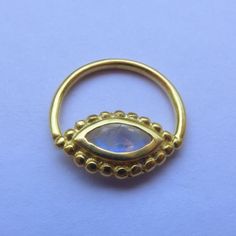 Hey, I found this really awesome Etsy listing at https://www.etsy.com/listing/237812293/moonstone-septum-ring-gold-septum-with Spiritual Round Septum Ring Gift, Spiritual Style Septum Ring Gift, Spiritual Gift Septum Ring, Spiritual Handmade Septum Ring As Gift, 18g Nose Ring, Ring Septum Piercing, Nose Ring Septum, Gold Septum, Piercing Nose