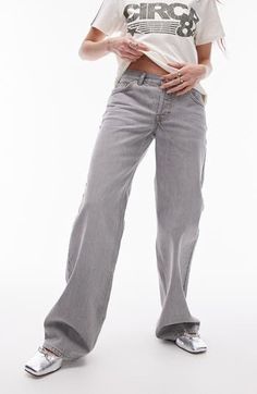 Low-slung nonstretch jeans are cut with puddling cuffs and turned to a dreamy shade of ultralight grey. 30" inseam; 21" leg opening; 10" front rise; 13 1/2" back rise (size 32) Zip fly with button closure Five-pocket style 100% cotton Machine wash, line dry Made in Turkey Gray Straight Leg Jeans For Fall, Mid-rise Gray Jeans For Fall, Fall Mid-rise Gray Jeans, Trendy Gray Wide Leg Flare Jeans, Spring Gray Denim Flare Jeans, Spring Gray Flare Denim Jeans, Gray Jeans For Everyday Fall Wear, Everyday Gray Bottoms For Spring, Everyday Spring Gray Bottoms